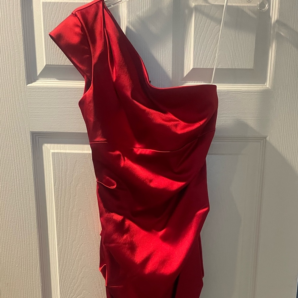 Beautiful red one shoulder dress.